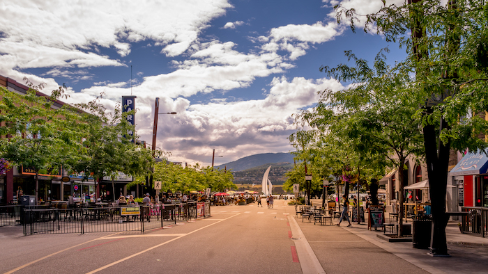 An image on the Cascadia Pacific Realty website, a Kelowna real estate agent. The image showcases a view  of Kelowna's downtown
